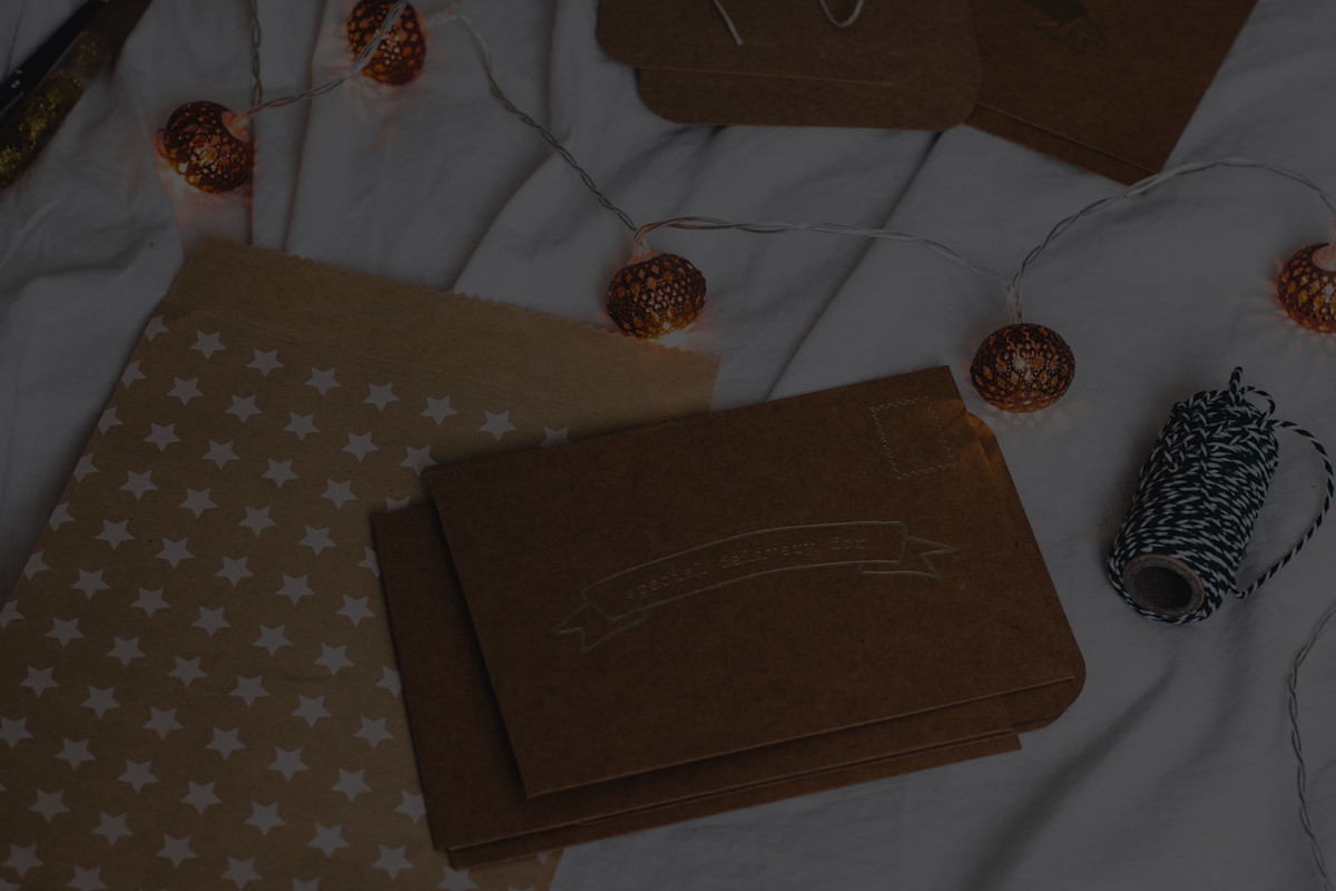 Brown paper packages with string and decorative lights